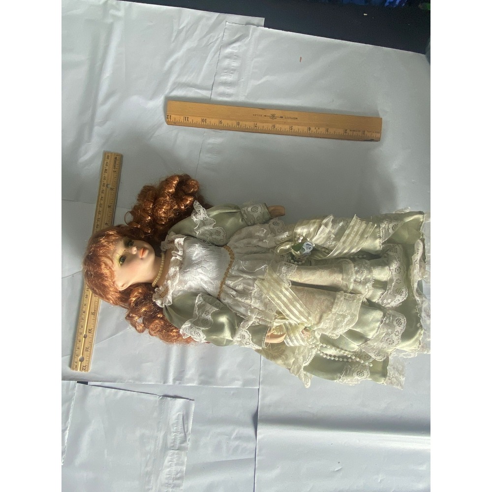 Vintage damaged Porcelain Doll‎ Red Hair Green Dress Lace Trim Collectible